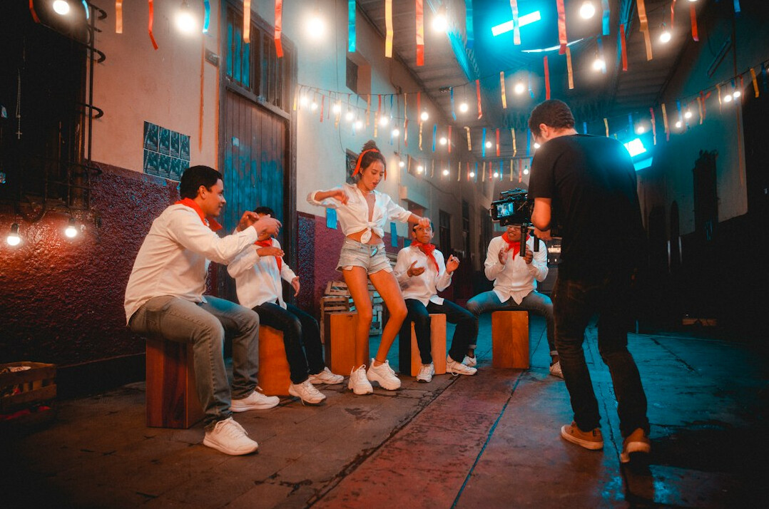 Group of students rehearsing a television segment together